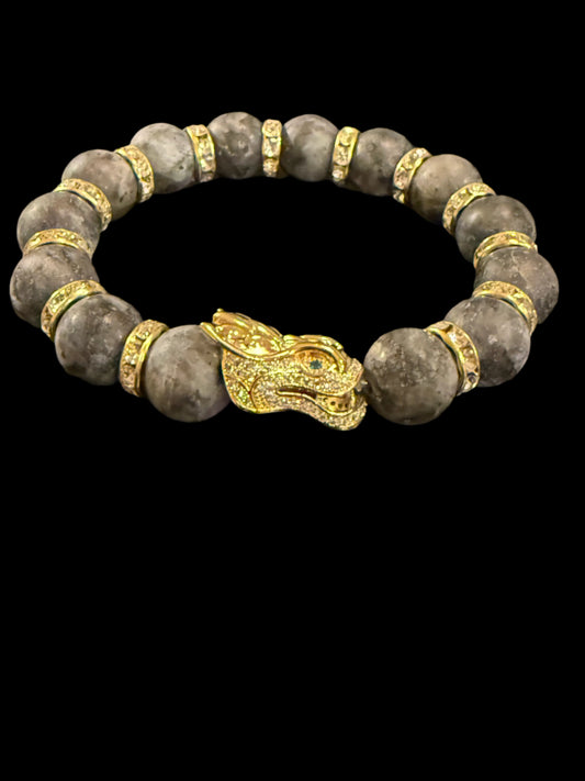 Labradorite stone with gold dragon