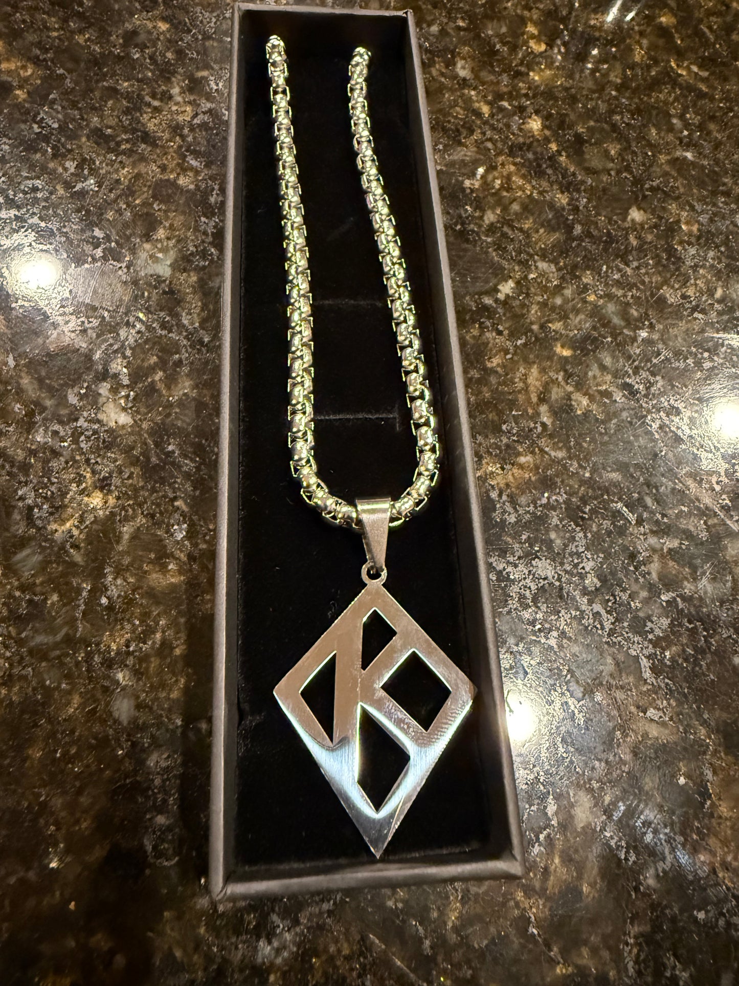 Silver stainless steel floating "K" Box chain
