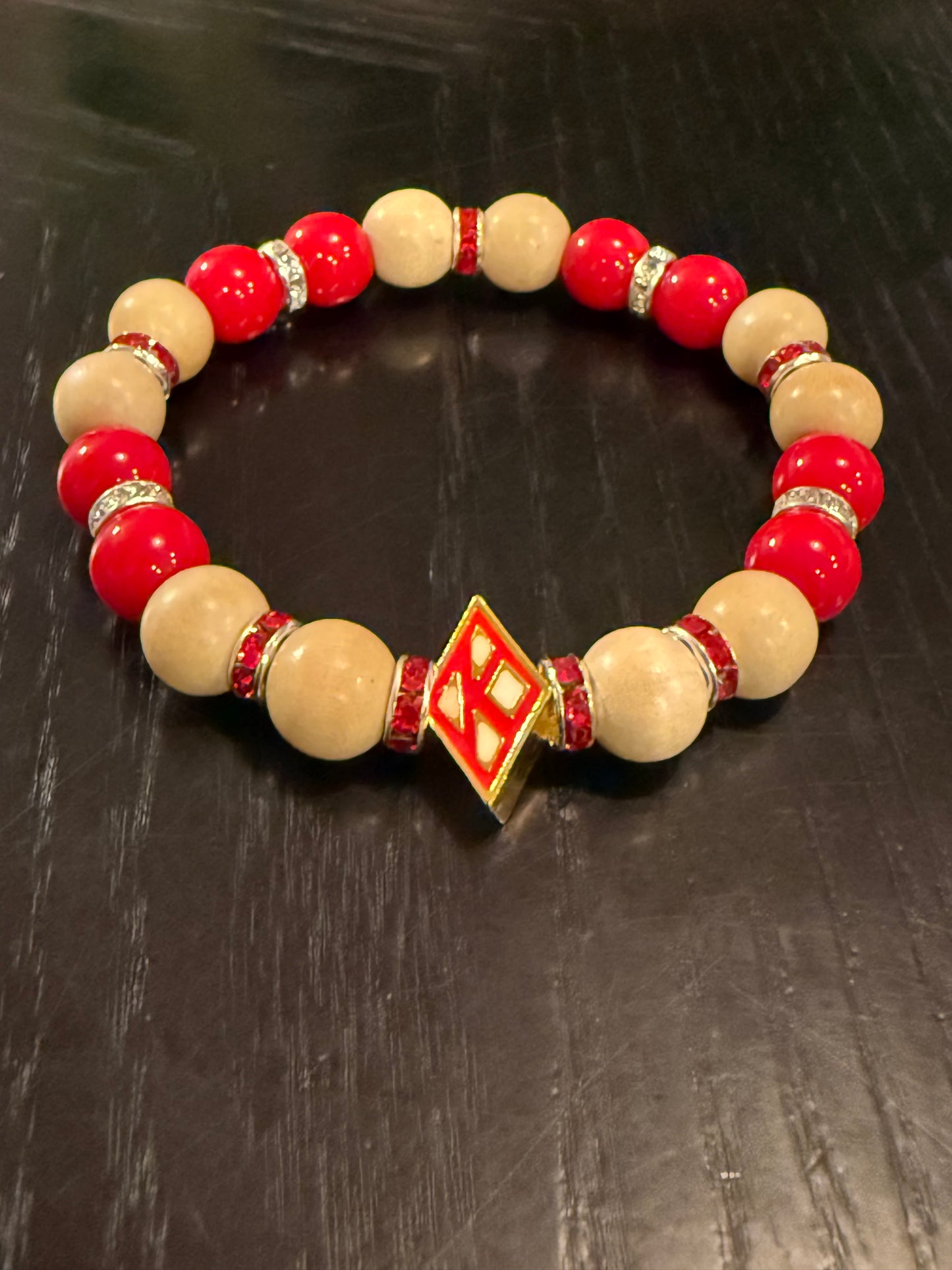 Floating "K" crimson and cream bracelet