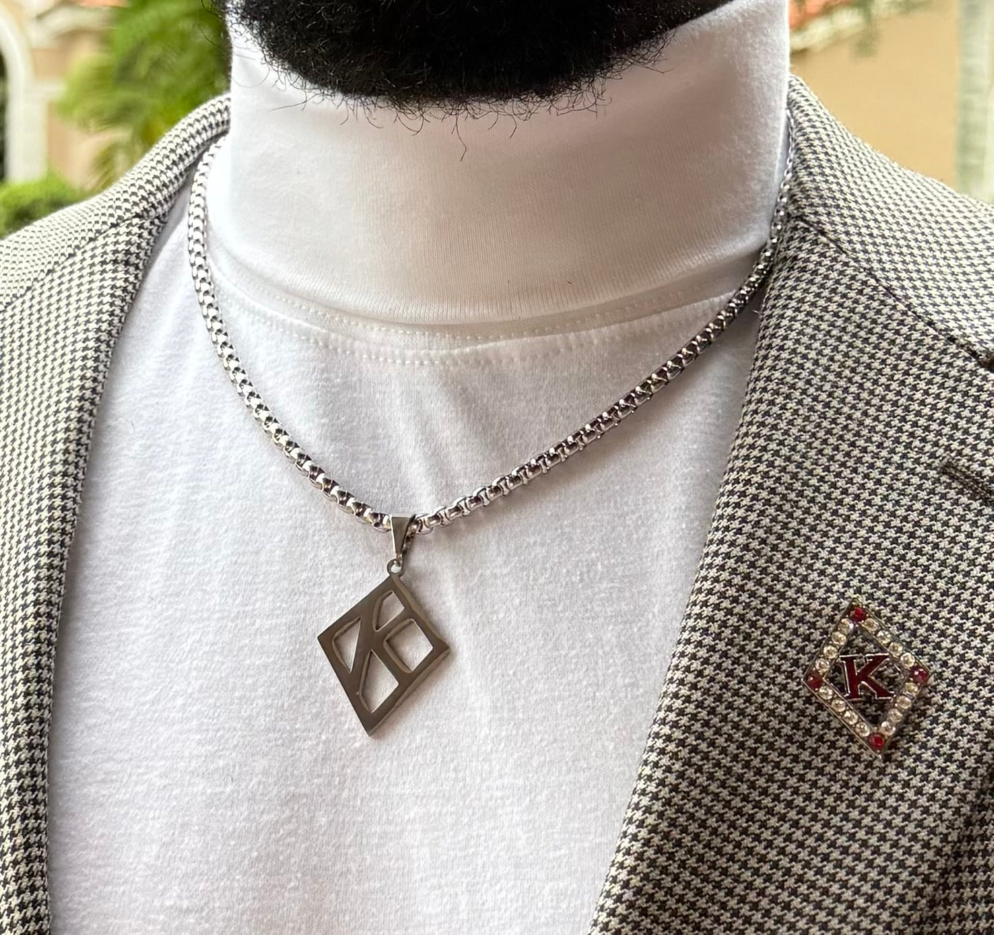 Floating 'K" Lapel pin