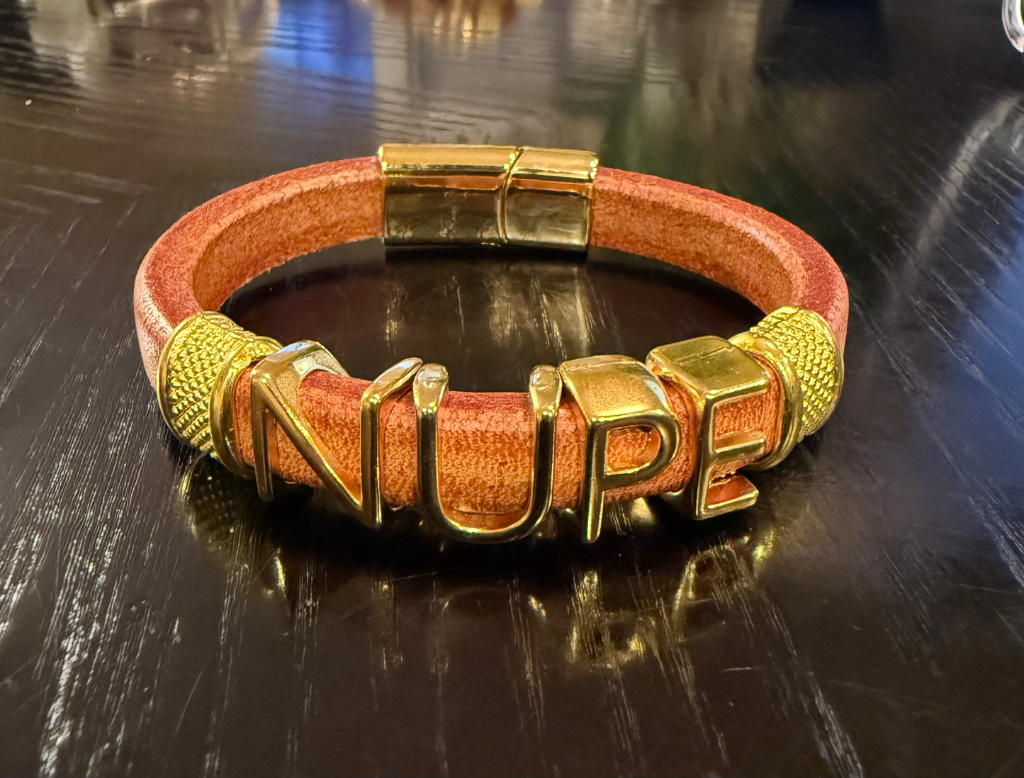 Gold NUPE Regaliz leather bracelet