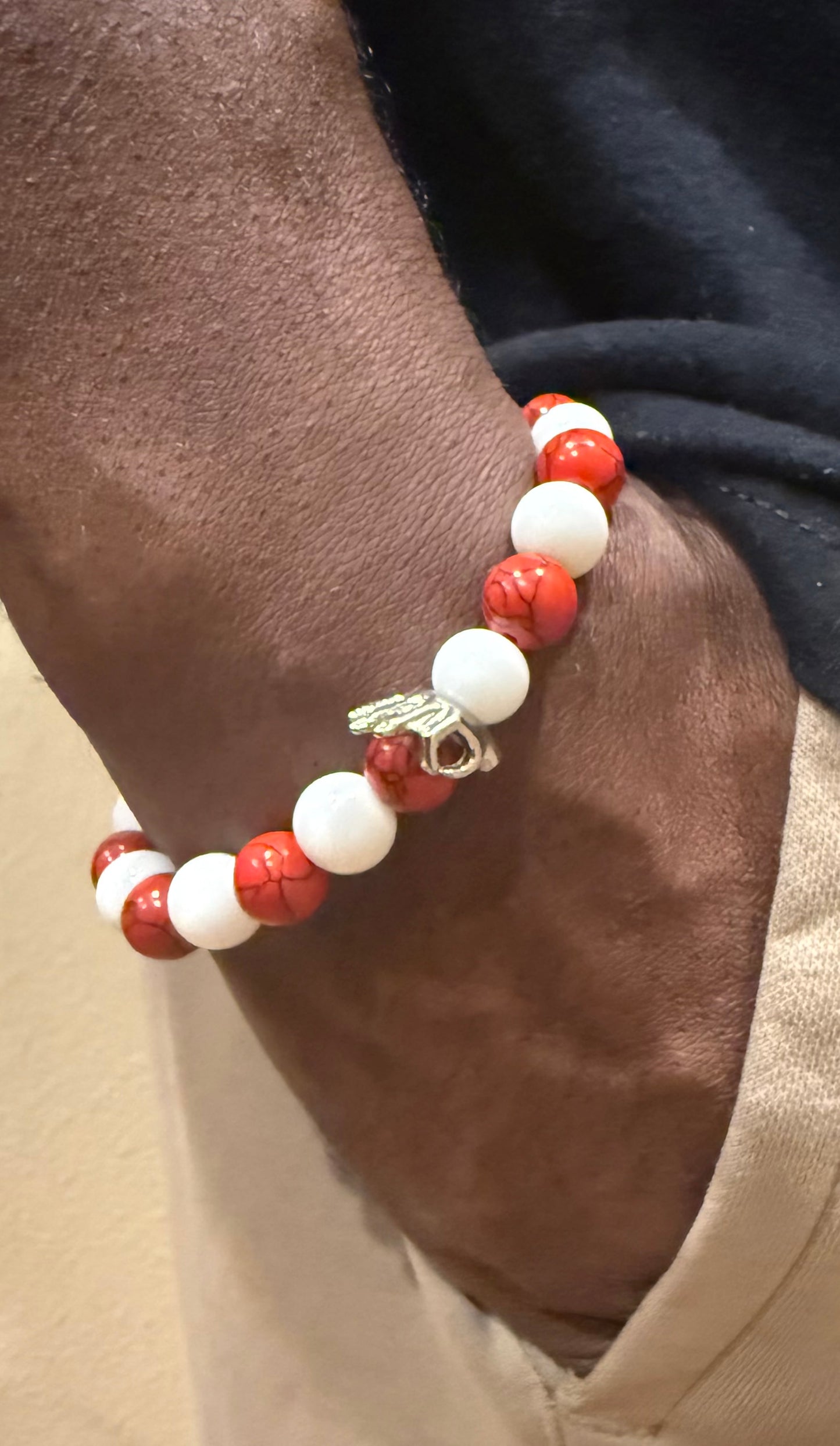 "Yo" red and white beaded bracelet