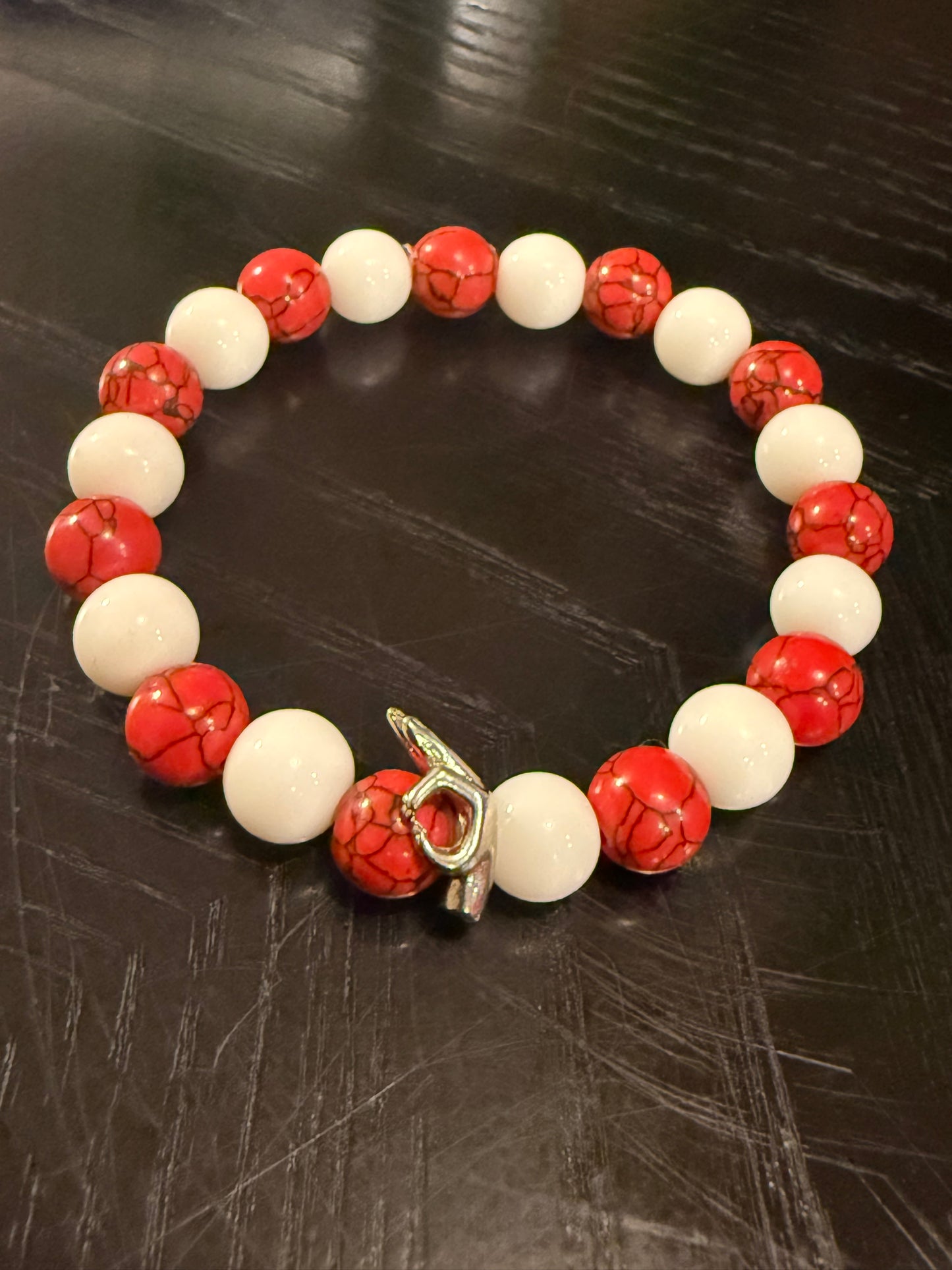 "Yo" red and white beaded bracelet
