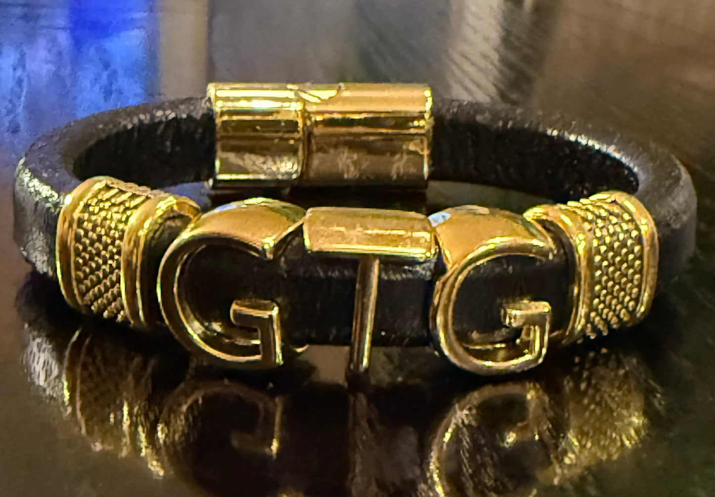 Gold Good Time Gang leather bracelet with gold lettering