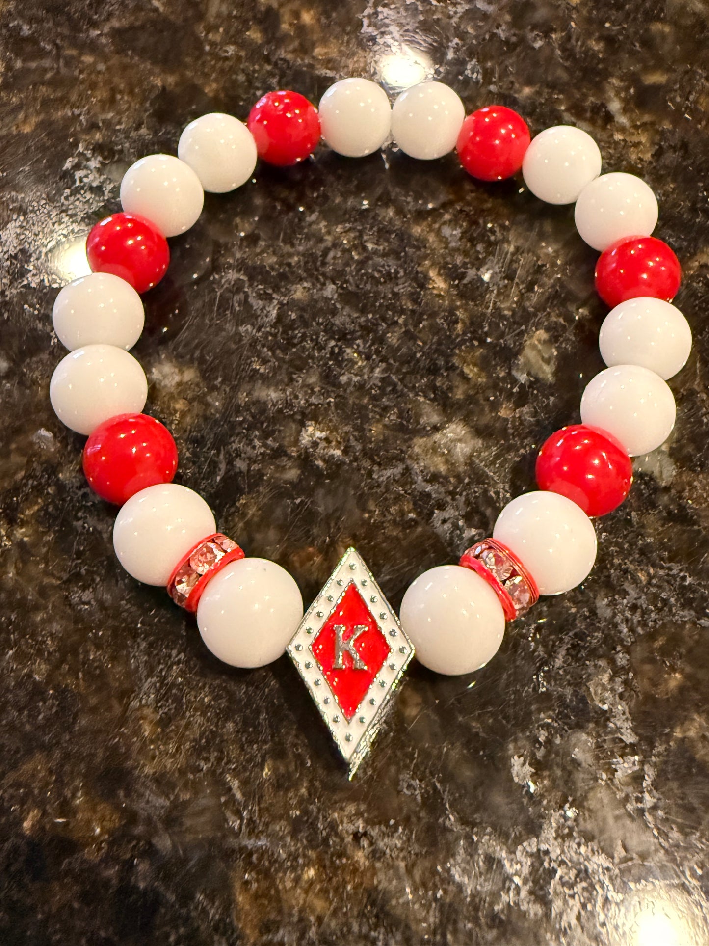 Red/White Floating K white/crimson bracelet