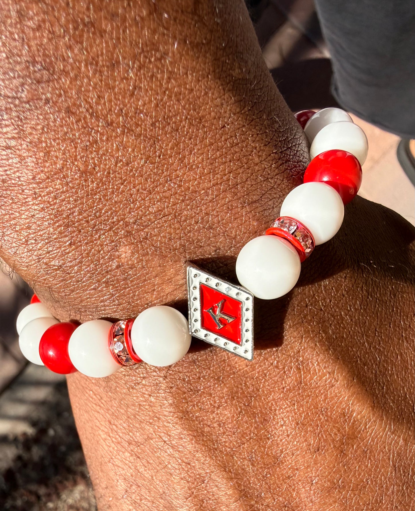 Red/White Floating K white/crimson bracelet